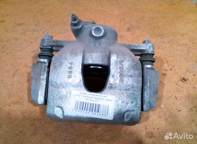 Суппорт тормозной передний правый VW Polo