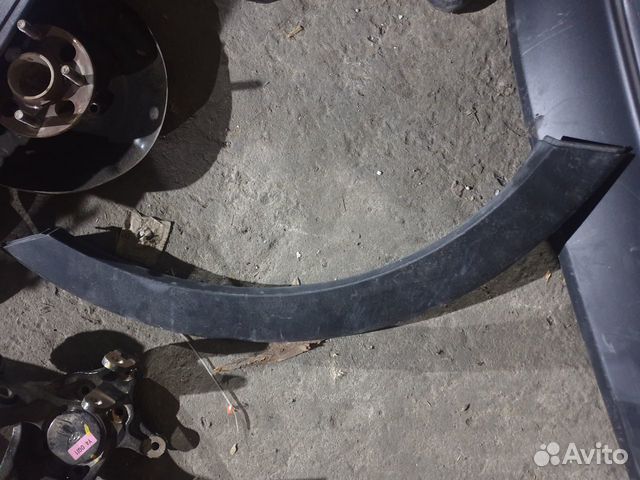 Накладка заднего крыла левого Kia Sportage 3 SL