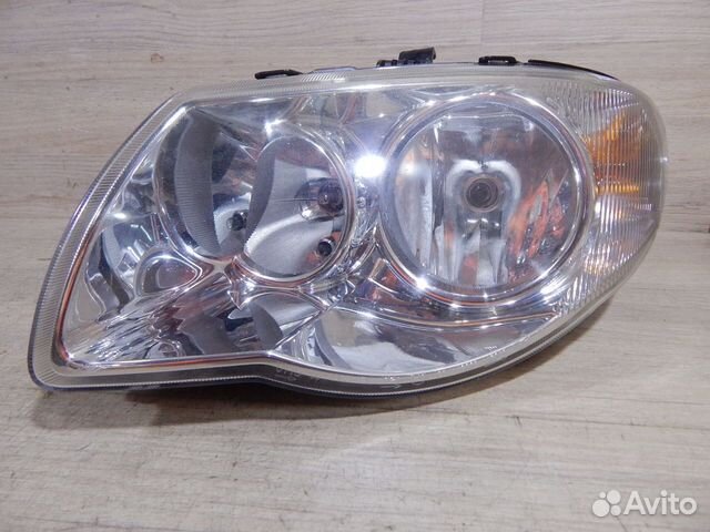 Фара левая Chrysler Voyager 4