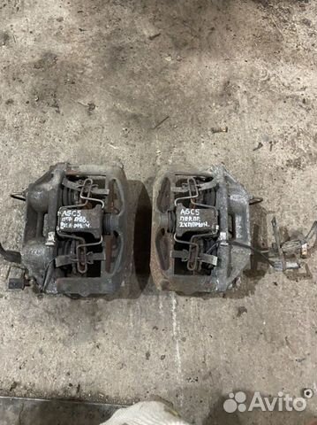 Суппорт передний двухпоршневой а6 с5