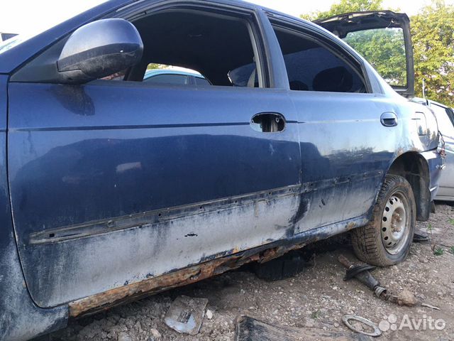 Двери на Kia spectra