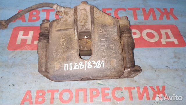 Суппорт тормозной передний Рено Сценик 1