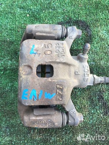 Тормозной суппорт задний правый Mitsubishi Legnum