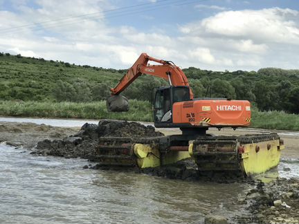 Аренда экскаватора плавающего (болотоход)