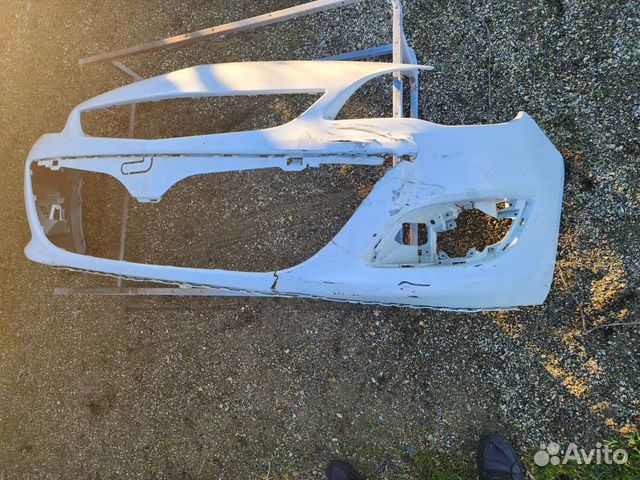 Бампер передний на opel astra j