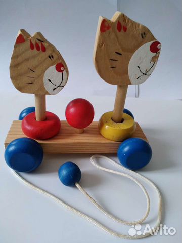 Деревянная игрушка - каталка