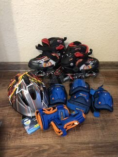 Роликовые коньки