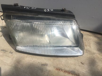 Фара левая Hella 1997-2000 vw passat b5