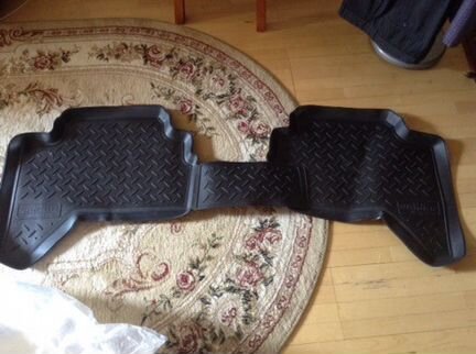 Продам новые задние салонные коврики на L200