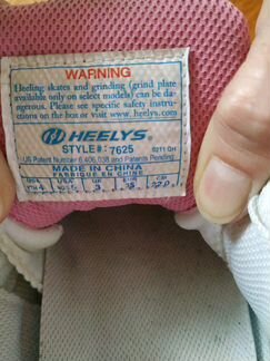 Кроссовки на колёсиках heelys