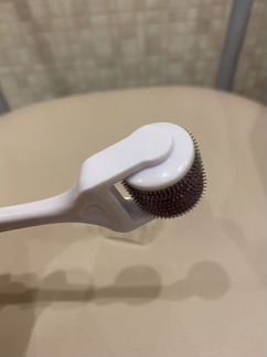 Роликовый массажер для лица